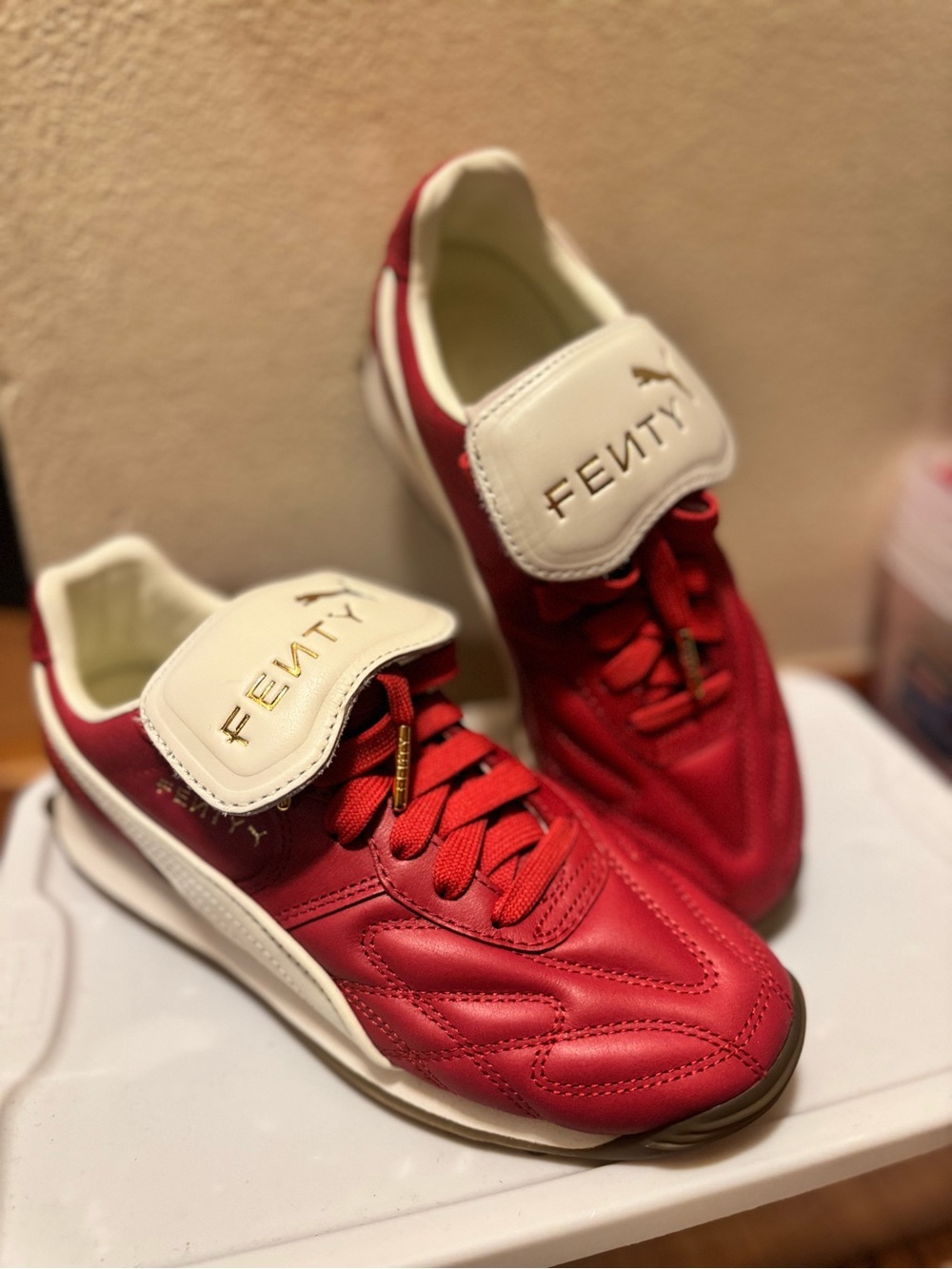 FENTY Red & White Women's Sneakers with Gold Logo Detail